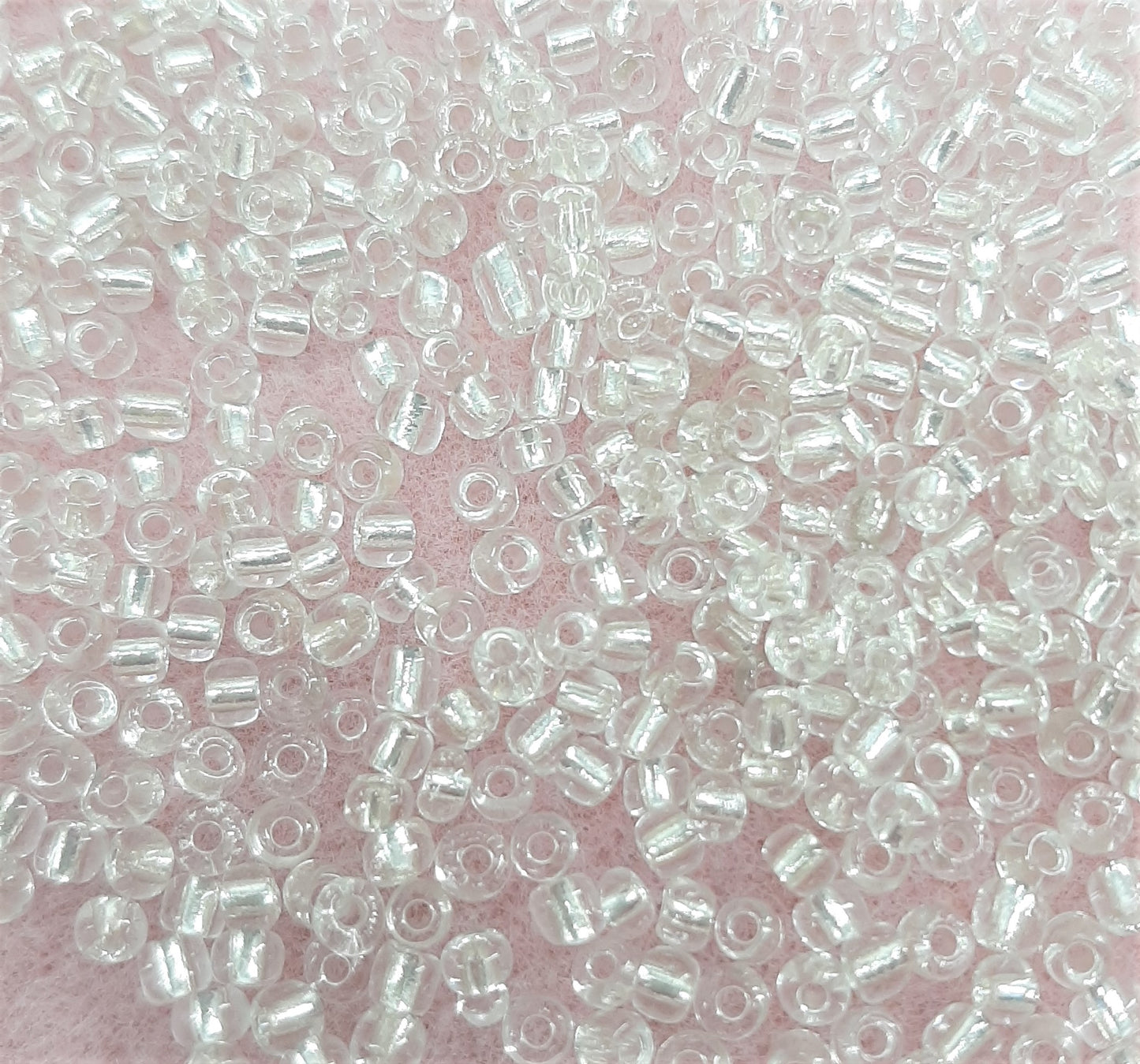 CLEAR GLASS/SILVER LINED SEED BEADS