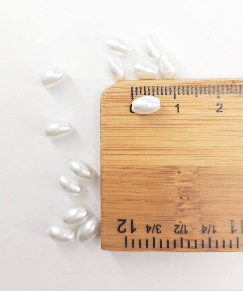 STRAND OF GLASS RICE PEARLS