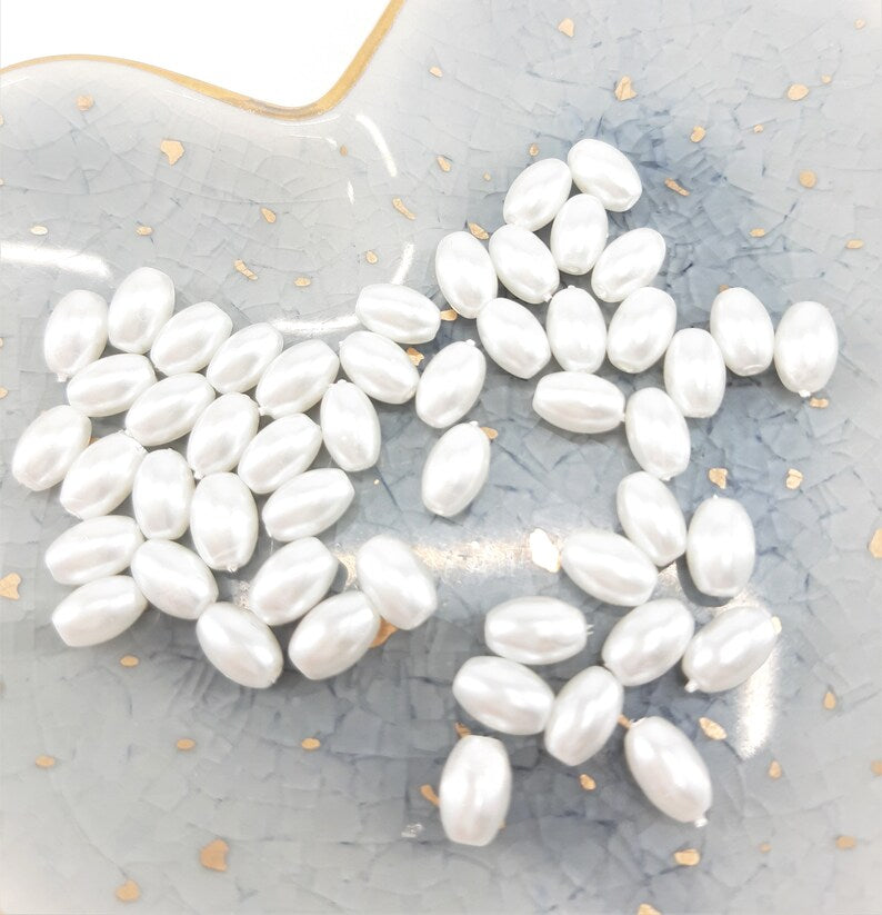 STRAND OF GLASS RICE PEARLS