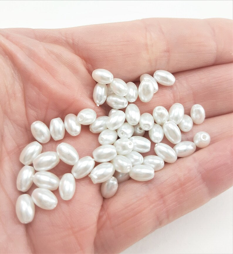 STRAND OF GLASS RICE PEARLS