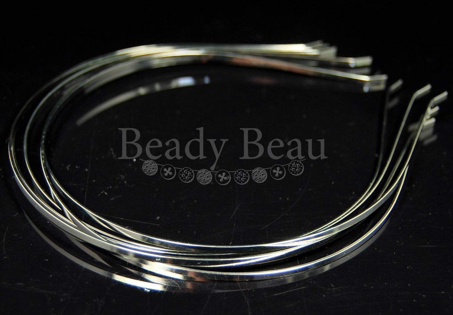 SILVER TONE TIARA HEADBANDS