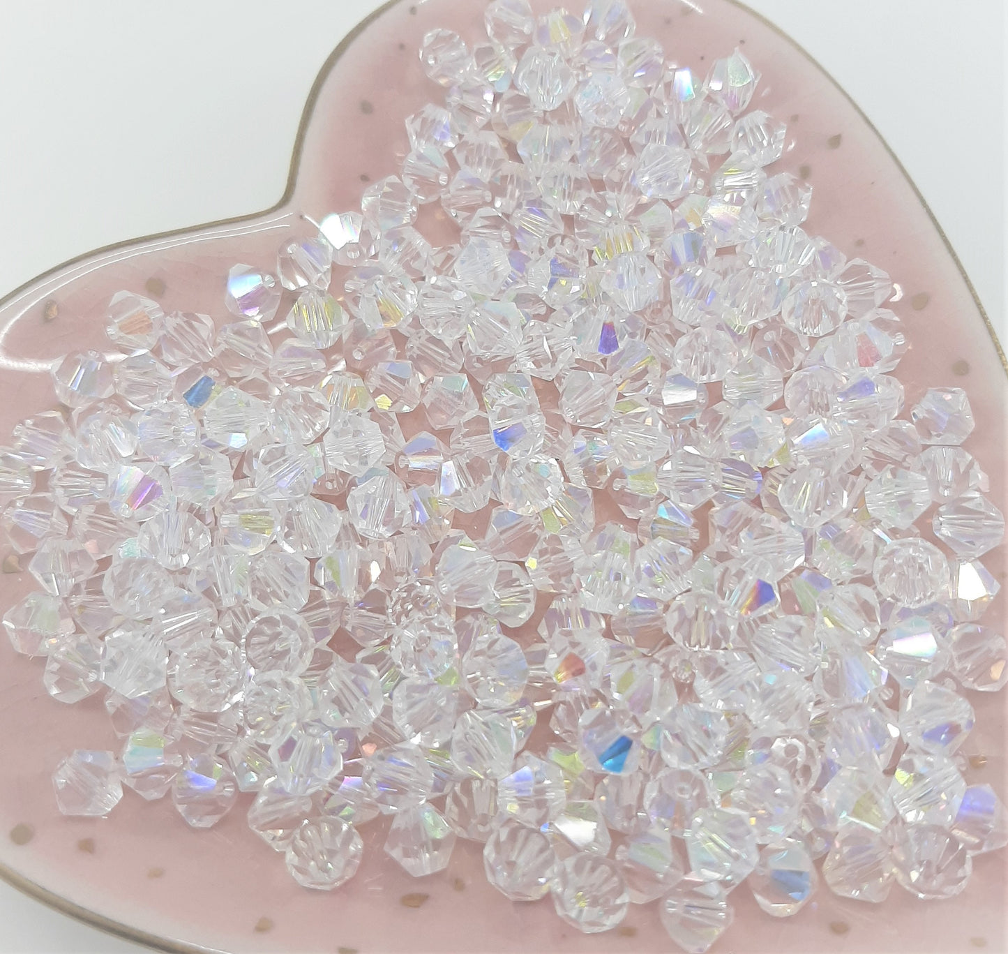TUBE GLASS BICONE BEADS