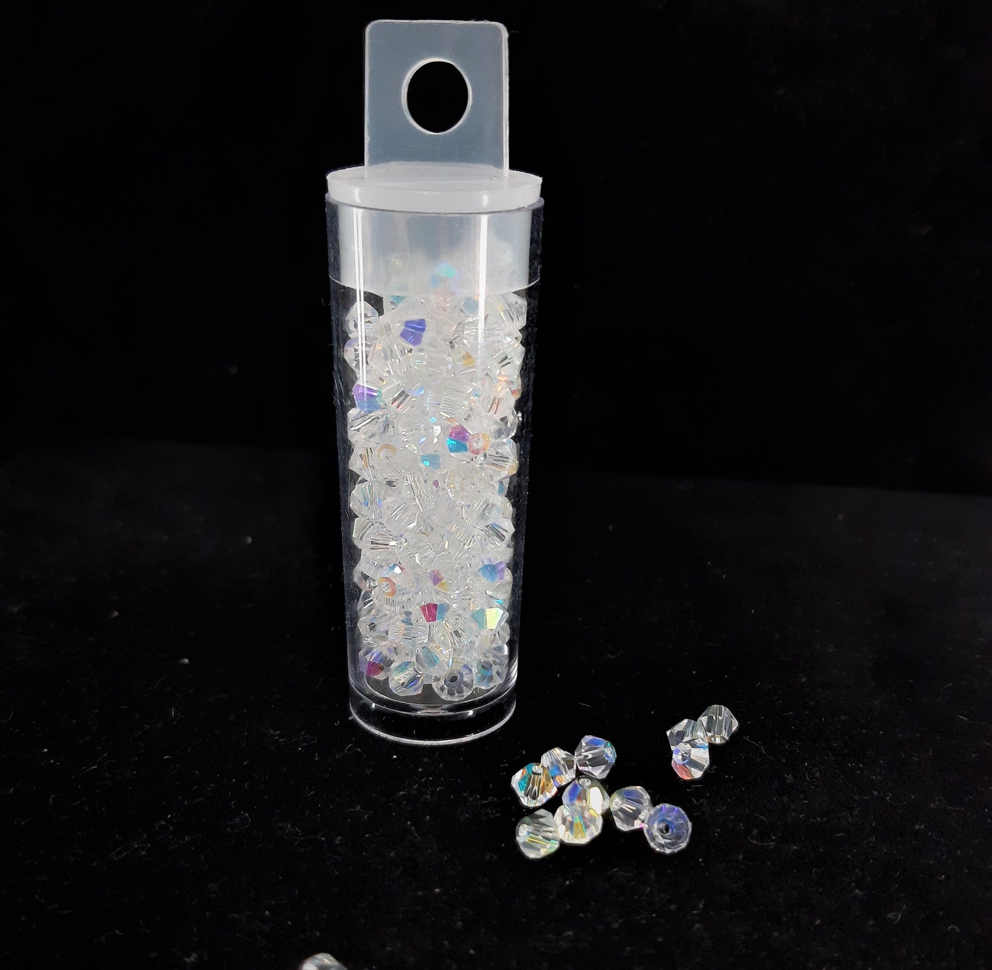 TUBE GLASS BICONE BEADS